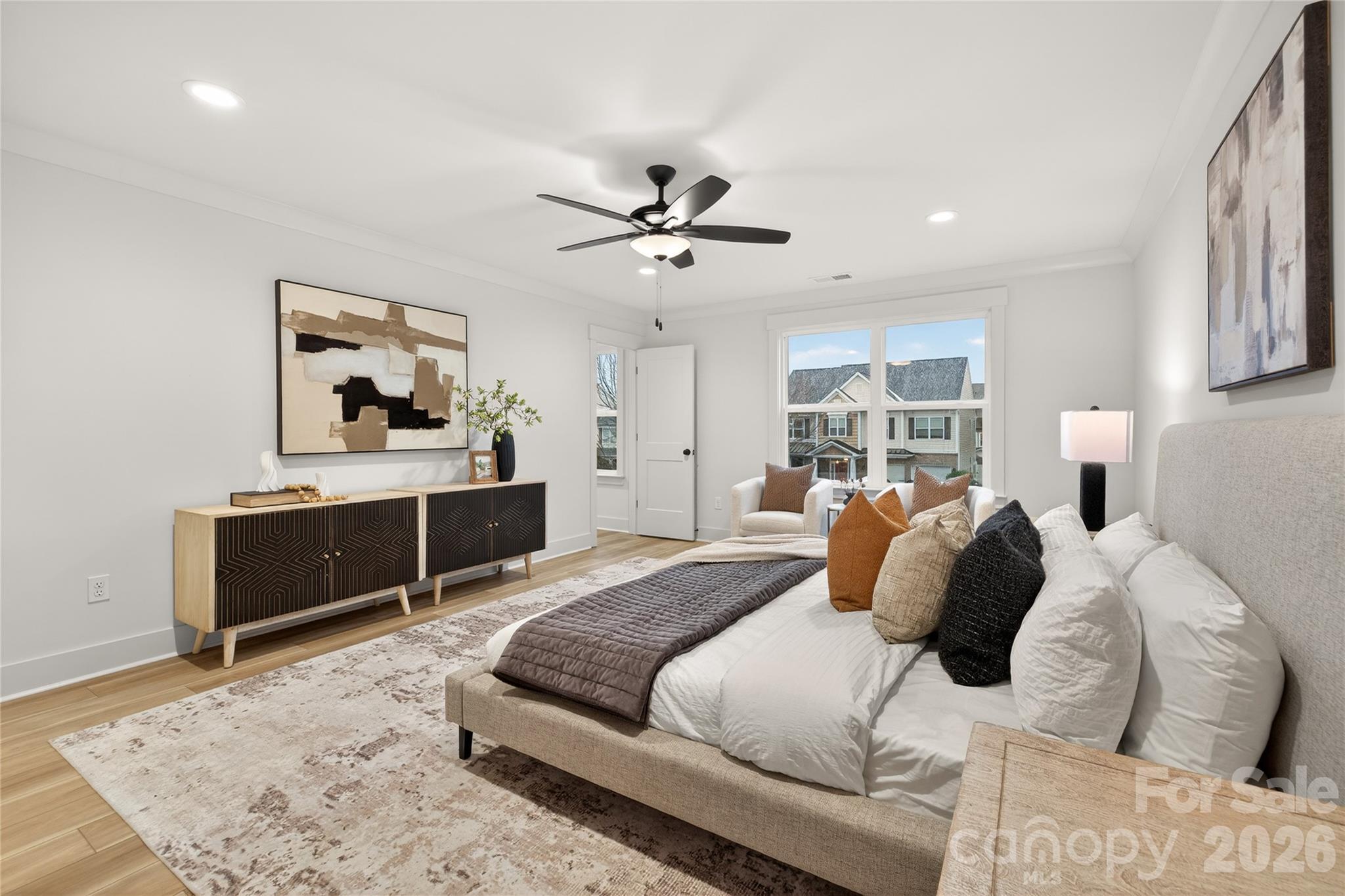 3388 Brackhill Street Davidson, NC 28036 - Photo 10 of 17 a bedroom with a bed and a dresser