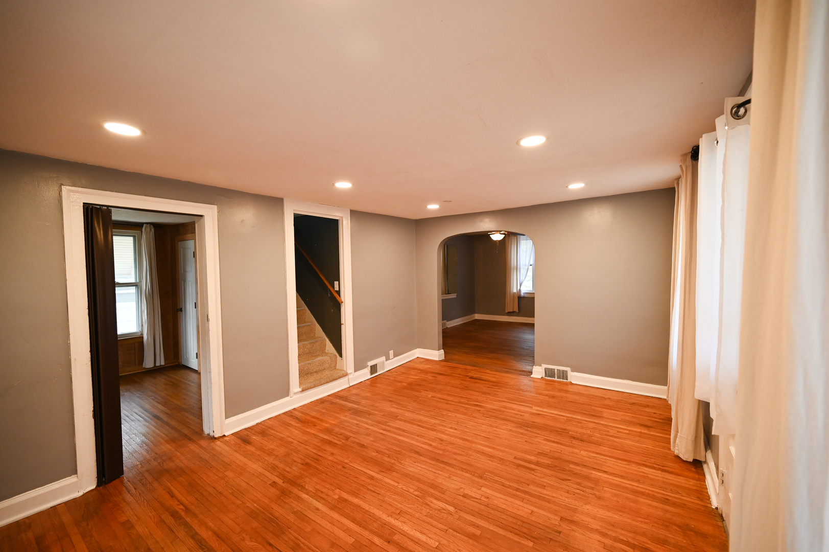 219 South 7th Street DeKalb, IL 60115 - Photo 11 of 30 a view of an empty room with wooden floor