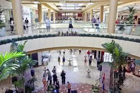 a view of swimming pool with outdoor seating
