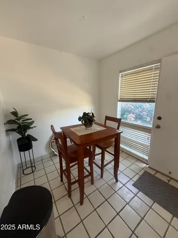 a view of a workspace with furniture