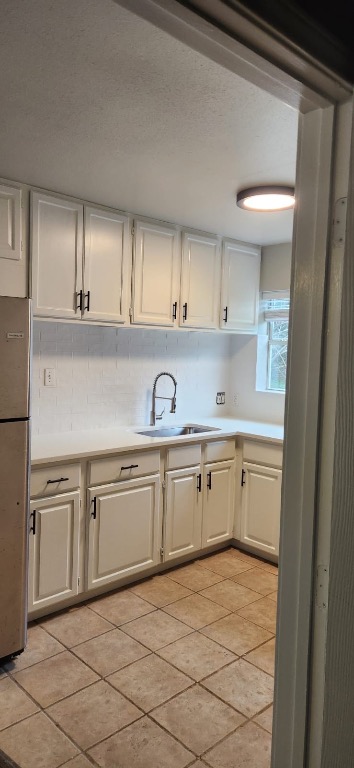 7705 Debbie Drive, Unit C Leander, TX 78641 - Photo 1 of 15 a kitchen with granite countertop a sink and cabinets