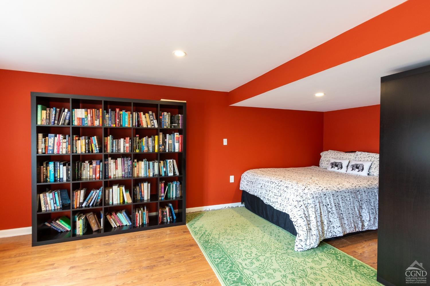 116 Battenfeld Road Milan, NY 12571 - Photo 20 of 23 a bedroom with bed and a book shelf