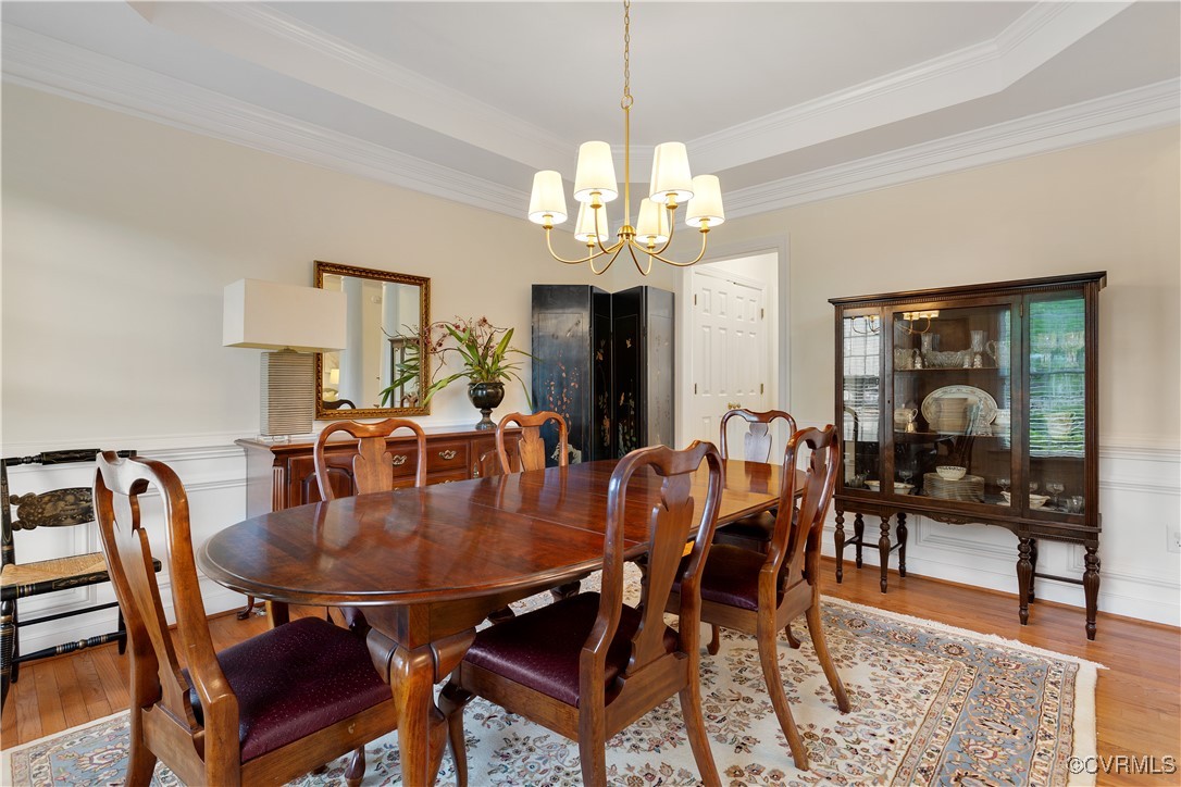 1007 Kingham Drive Midlothian, VA 23114 - Photo 12 of 42 a view of a dining room with furniture and chandelier