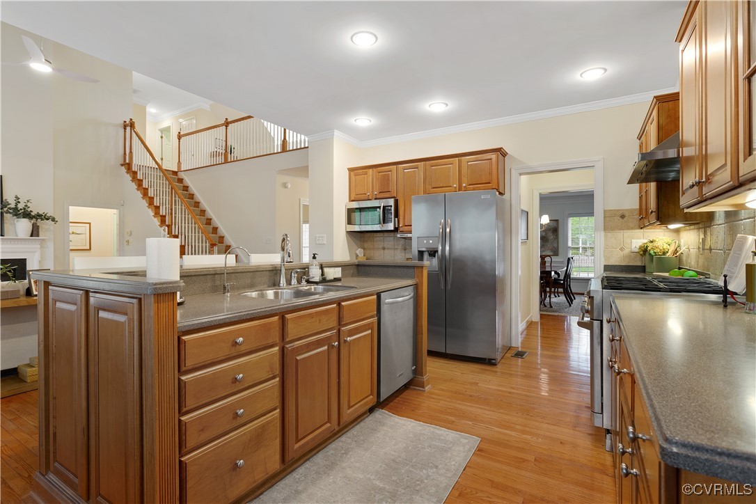 1007 Kingham Drive Midlothian, VA 23114 - Photo 23 of 42 a kitchen with stainless steel appliances granite countertop a refrigerator a oven and a sink