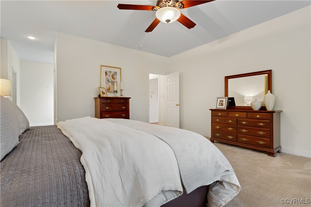 1007 Kingham Drive Midlothian, VA 23114 - Photo 29 of 42 a bedroom with a bed and a dresser