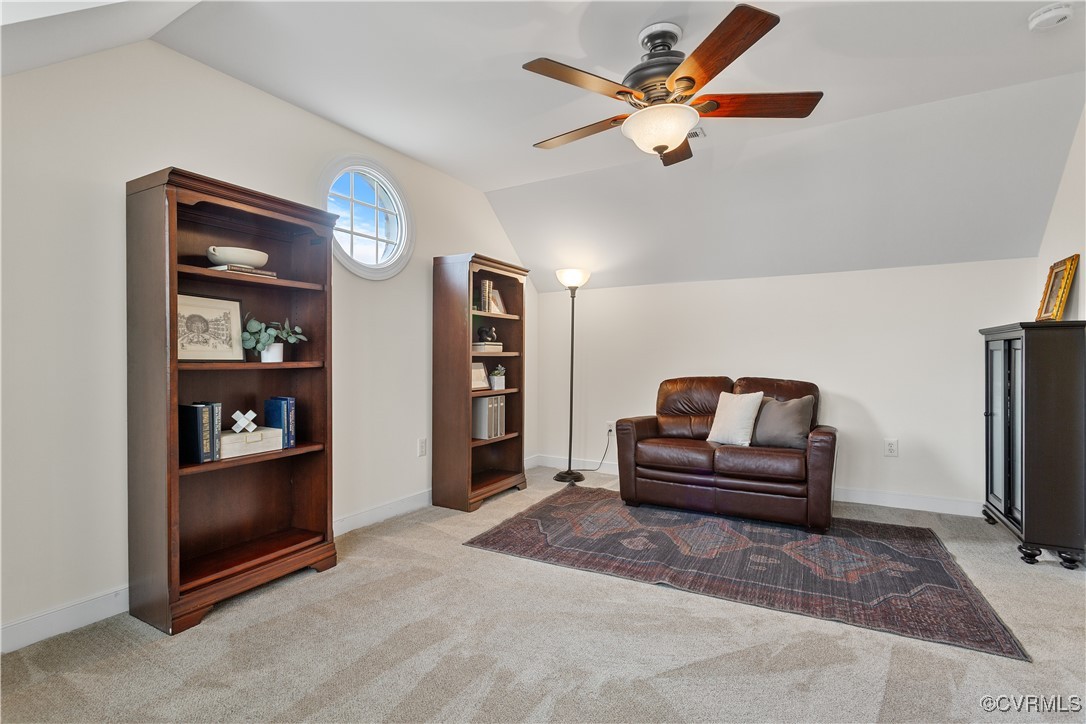 1007 Kingham Drive Midlothian, VA 23114 - Photo 37 of 42 a living room with furniture and a flat screen tv