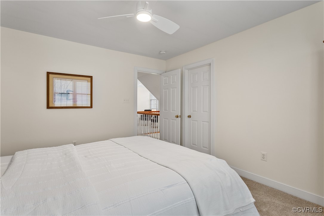 1007 Kingham Drive Midlothian, VA 23114 - Photo 41 of 42 a bedroom with a bed and a painting on the wall