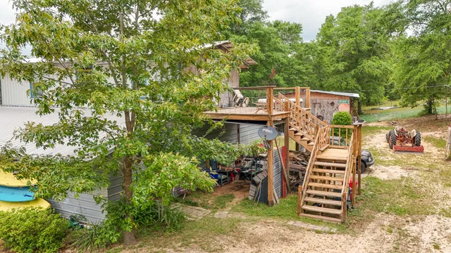 a backyard of a house with seating space