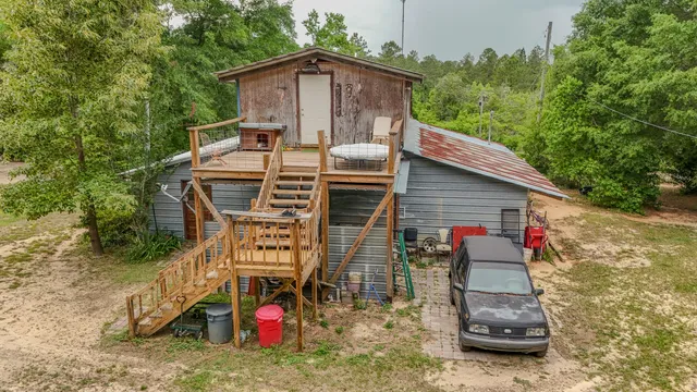 a view of a yard with an outdoor space