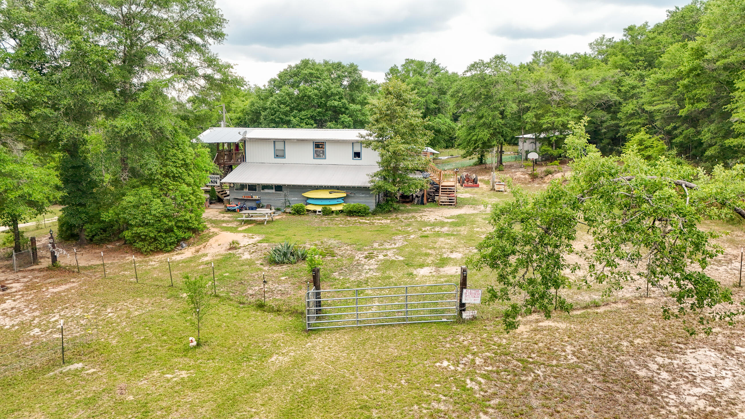 841 North 1st Street DeFuniak Springs, FL 32433 - Photo 17 of 63 a view of a yard with an outdoor space