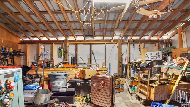 a view of a dining area with furniture and a chandelier