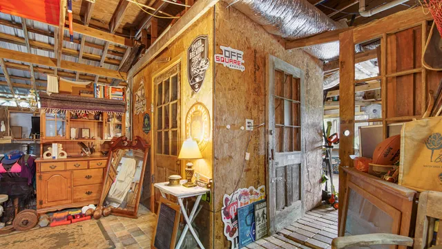a kitchen with a stove and a refrigerator