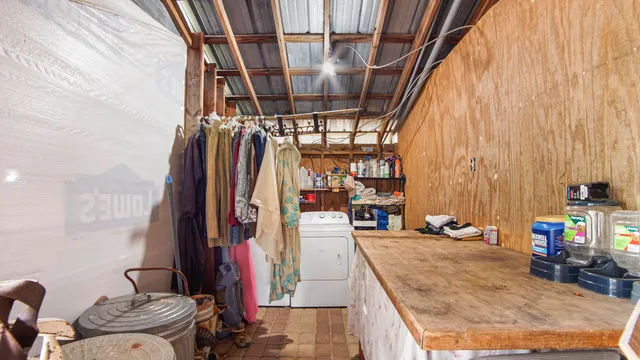 a bathroom with a toilet a sink and a mirror