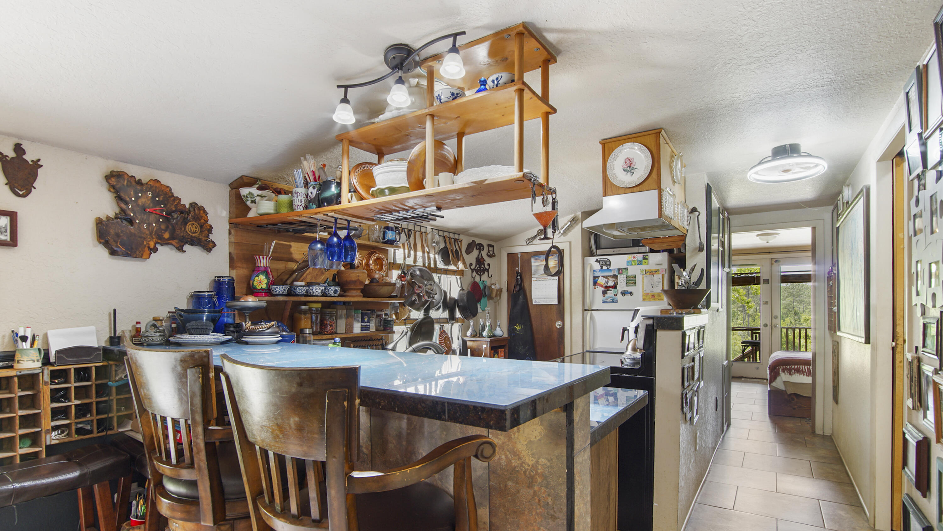 841 North 1st Street DeFuniak Springs, FL 32433 - Photo 39 of 63 a view of a dining area with furniture and a chandelier