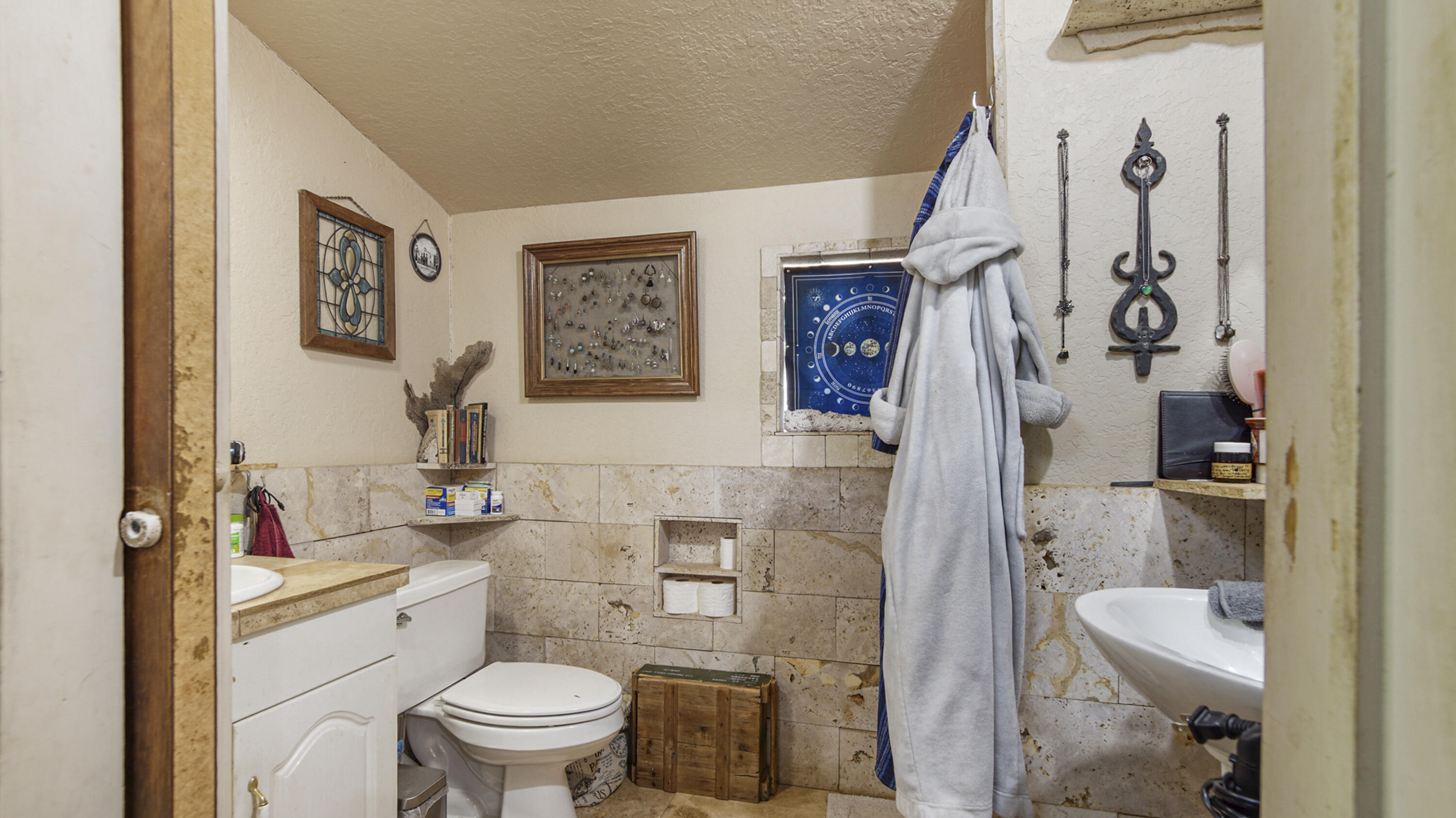 841 North 1st Street DeFuniak Springs, FL 32433 - Photo 43 of 63 a bathroom with a toilet sink and shower curtain
