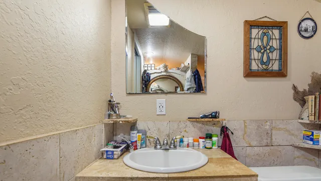 a living room with furniture and a rug