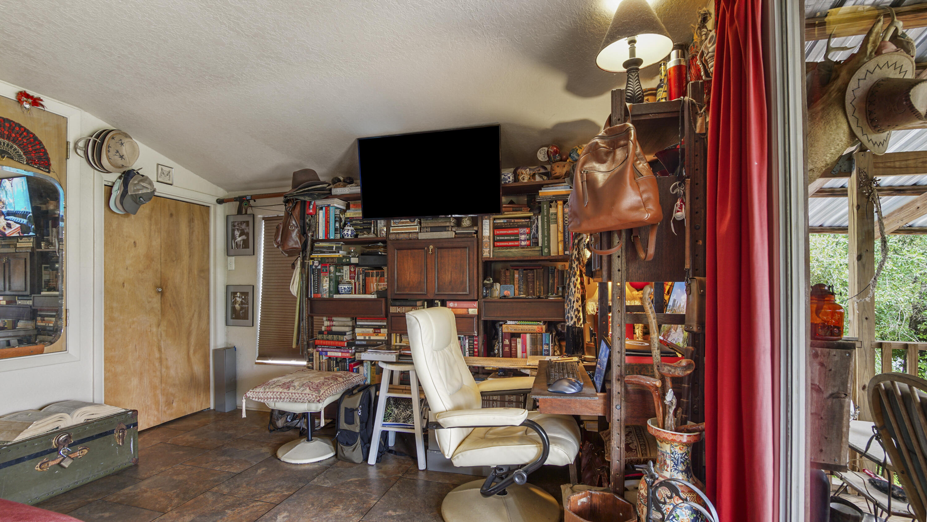 841 North 1st Street DeFuniak Springs, FL 32433 - Photo 50 of 63 a view of a livingroom with furniture and a flat screen tv