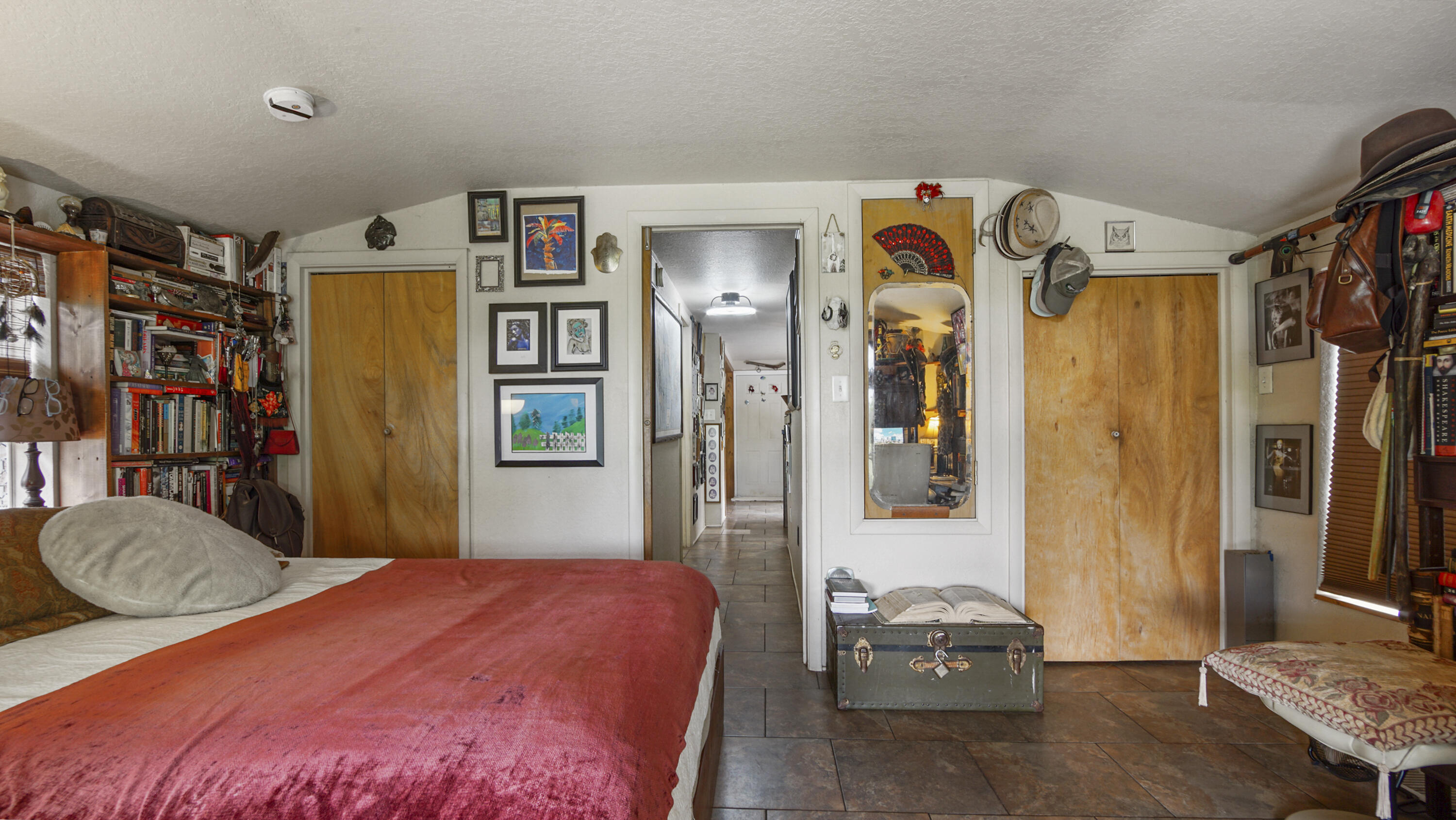 841 North 1st Street DeFuniak Springs, FL 32433 - Photo 51 of 63 a bedroom with a bed and a book shelf