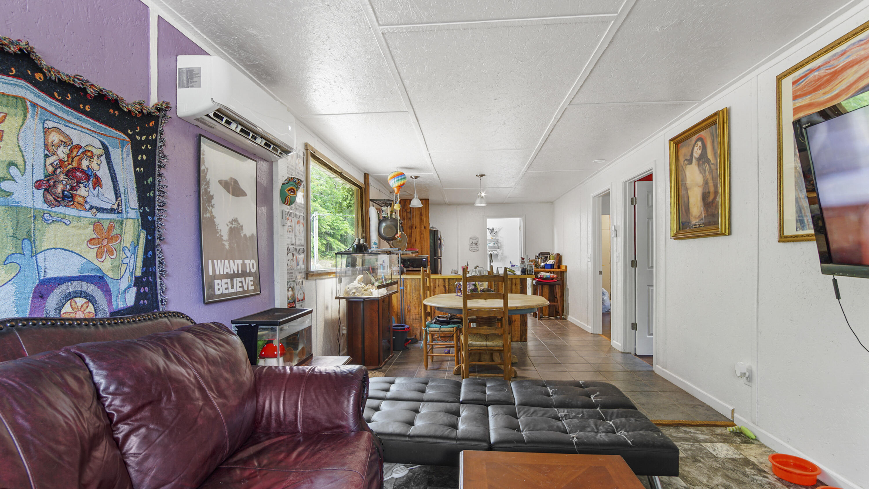 841 North 1st Street DeFuniak Springs, FL 32433 - Photo 55 of 63 a living room with furniture and a rug