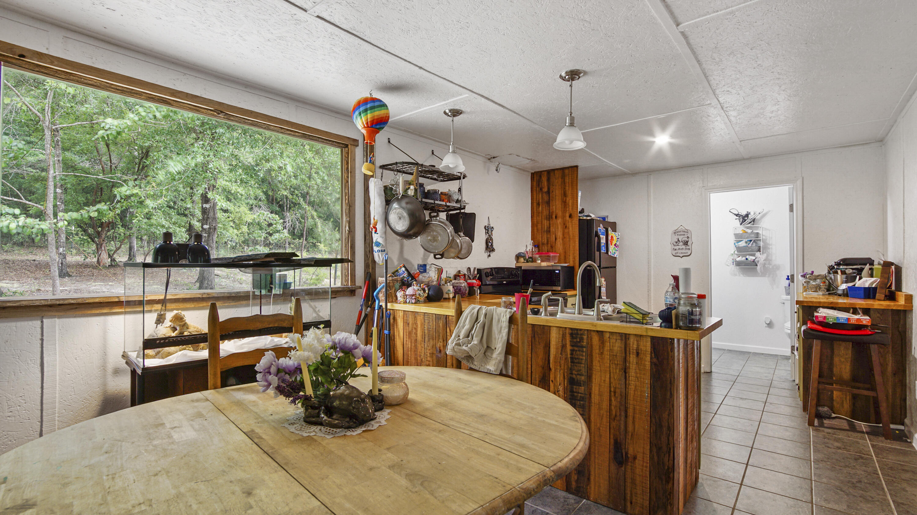 841 North 1st Street DeFuniak Springs, FL 32433 - Photo 56 of 63 a view of a dining room with furniture window and outside view