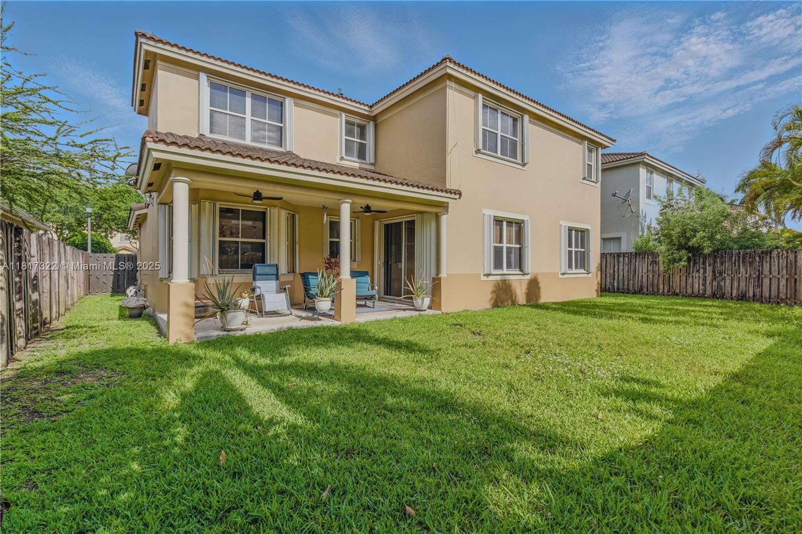 12251 Southwest 122nd Path Miami, FL 33186 - Photo 23 of 56 a view of a house with a yard and sitting area