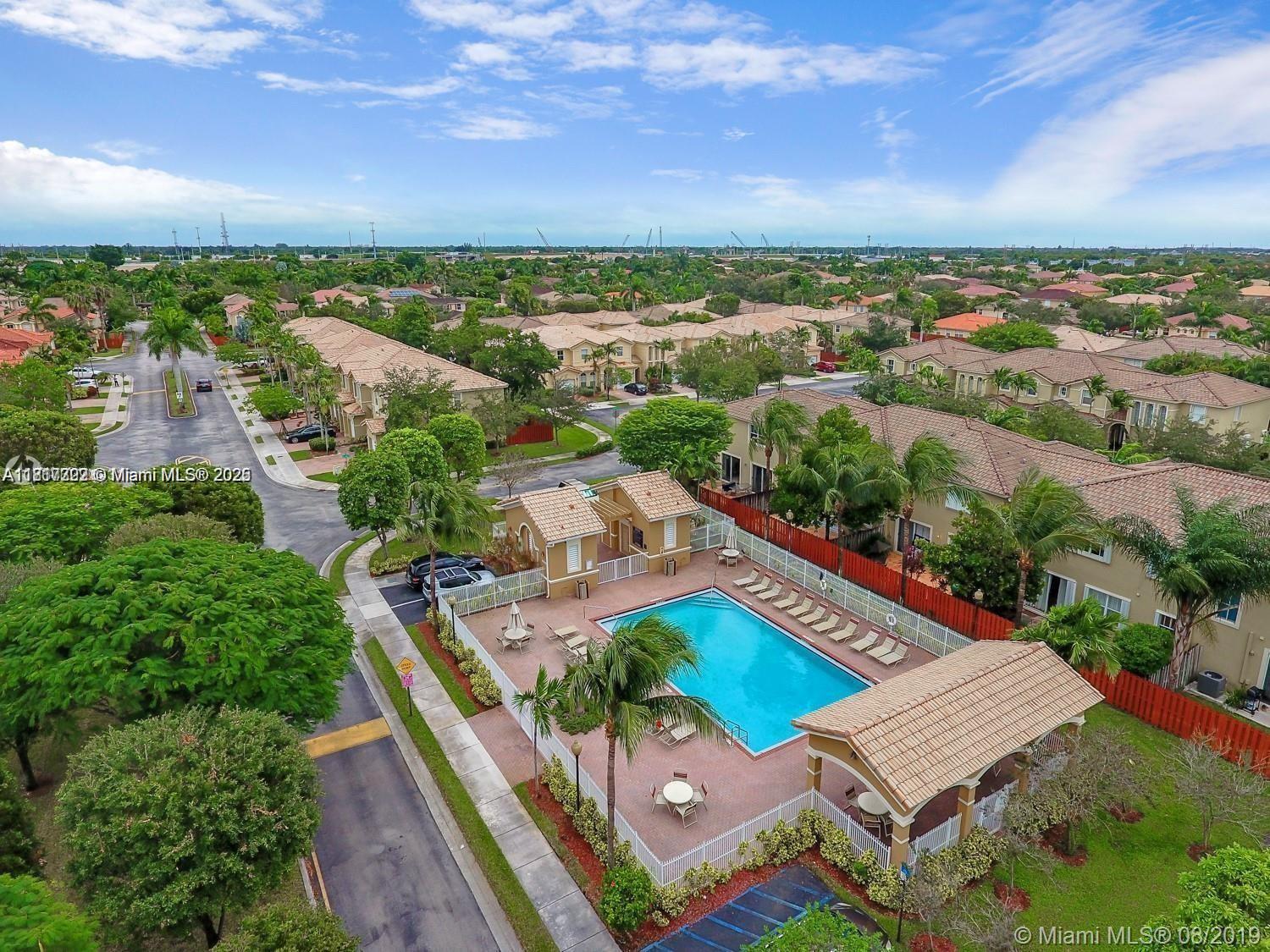 12251 Southwest 122nd Path Miami, FL 33186 - Photo 3 of 56 an aerial view of a house with a garden