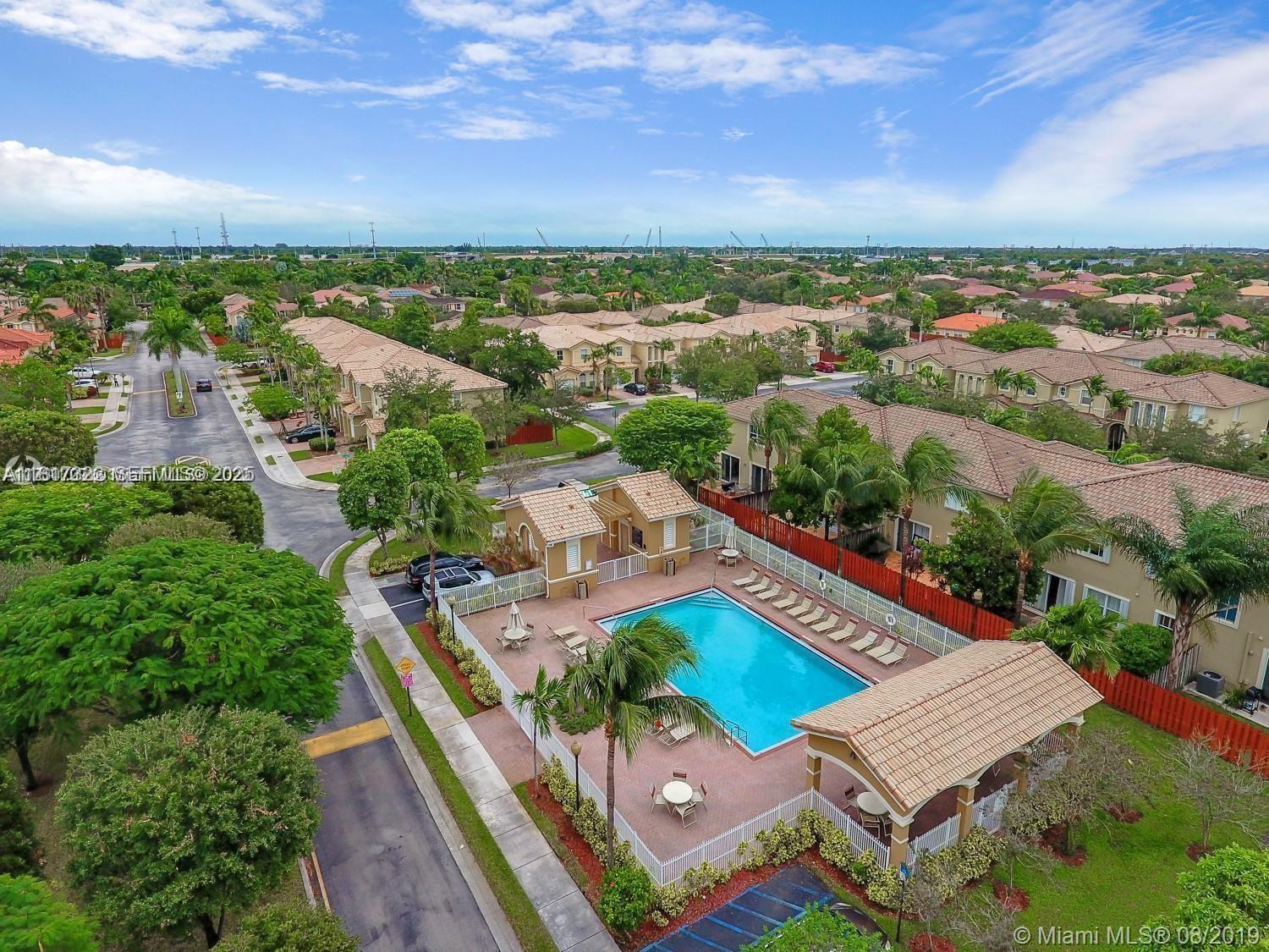 12251 Southwest 122nd Path Miami, FL 33186 - Photo 3 of 56 an aerial view of a house with a garden