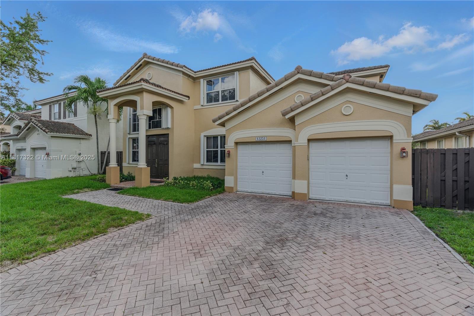 12251 Southwest 122nd Path Miami, FL 33186 - Photo 42 of 56 front view of house with a yard