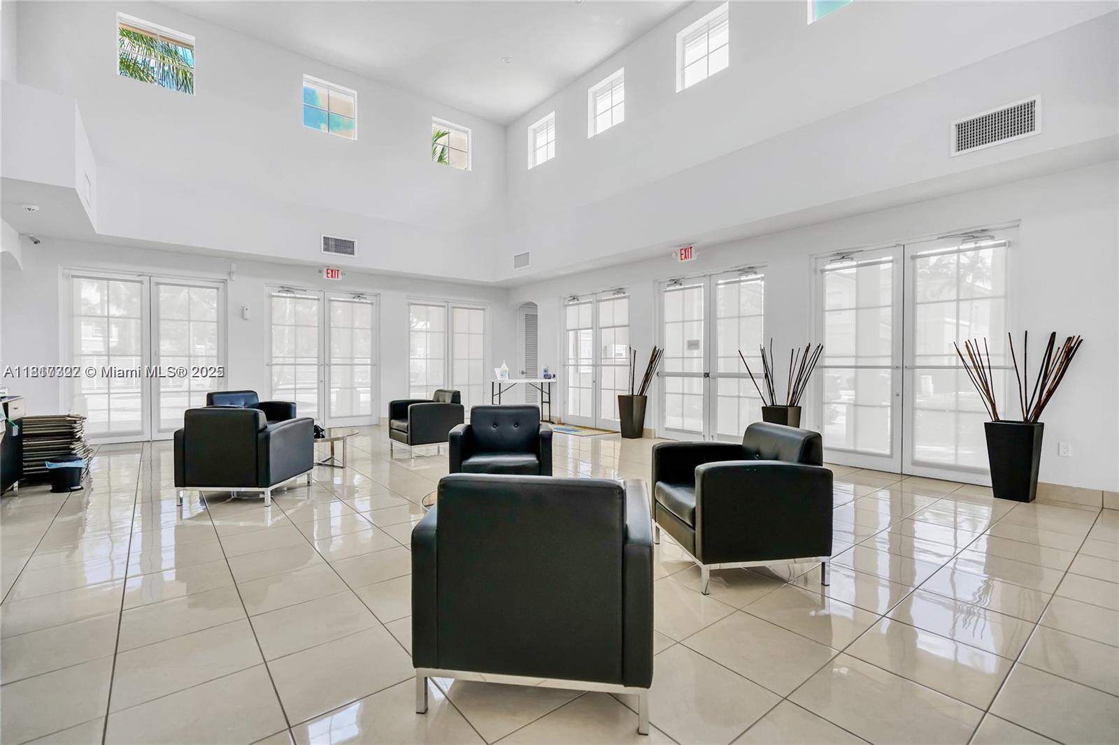 12251 Southwest 122nd Path Miami, FL 33186 - Photo 47 of 56 a living room with fireplace furniture and a window