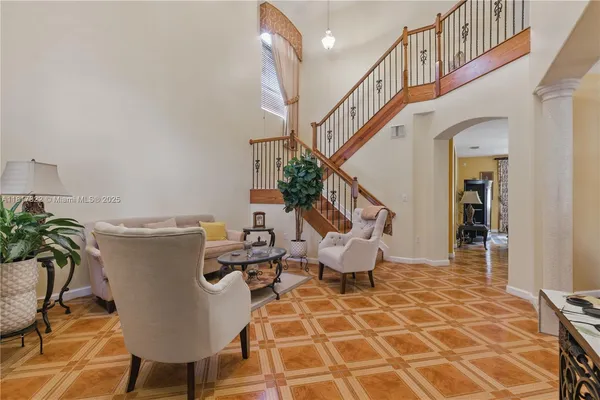 a view of a dining room with furniture window and outside view