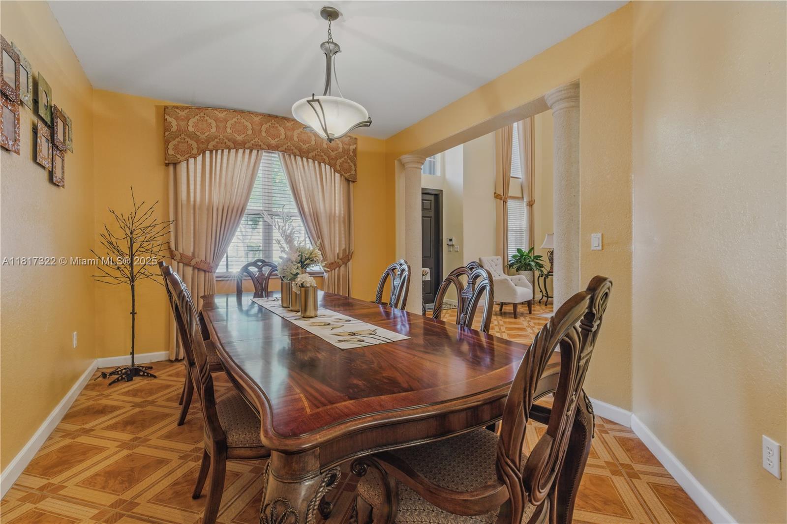 12251 Southwest 122nd Path Miami, FL 33186 - Photo 10 of 56 a view of a dining room with furniture window and outside view