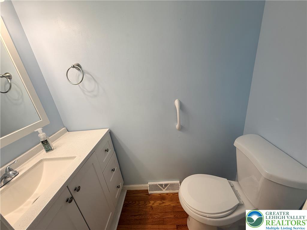 170 Springhouse Road Allentown, PA 18104 - Photo 12 of 23 A well-appointed bathroom with a sleek vanity and convenient amenities awaits.