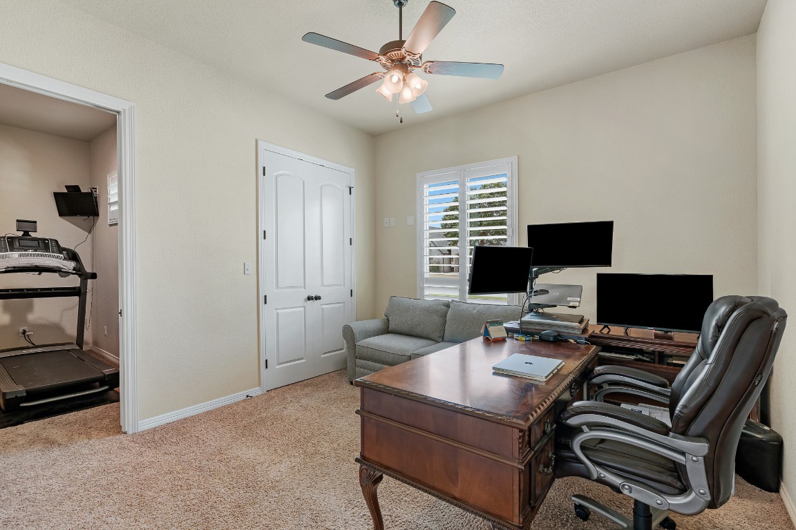 144 Indian Ridge Road Belton, TX 76513 - Photo 15 of 24 Office area with light colored carpet and ceiling fan