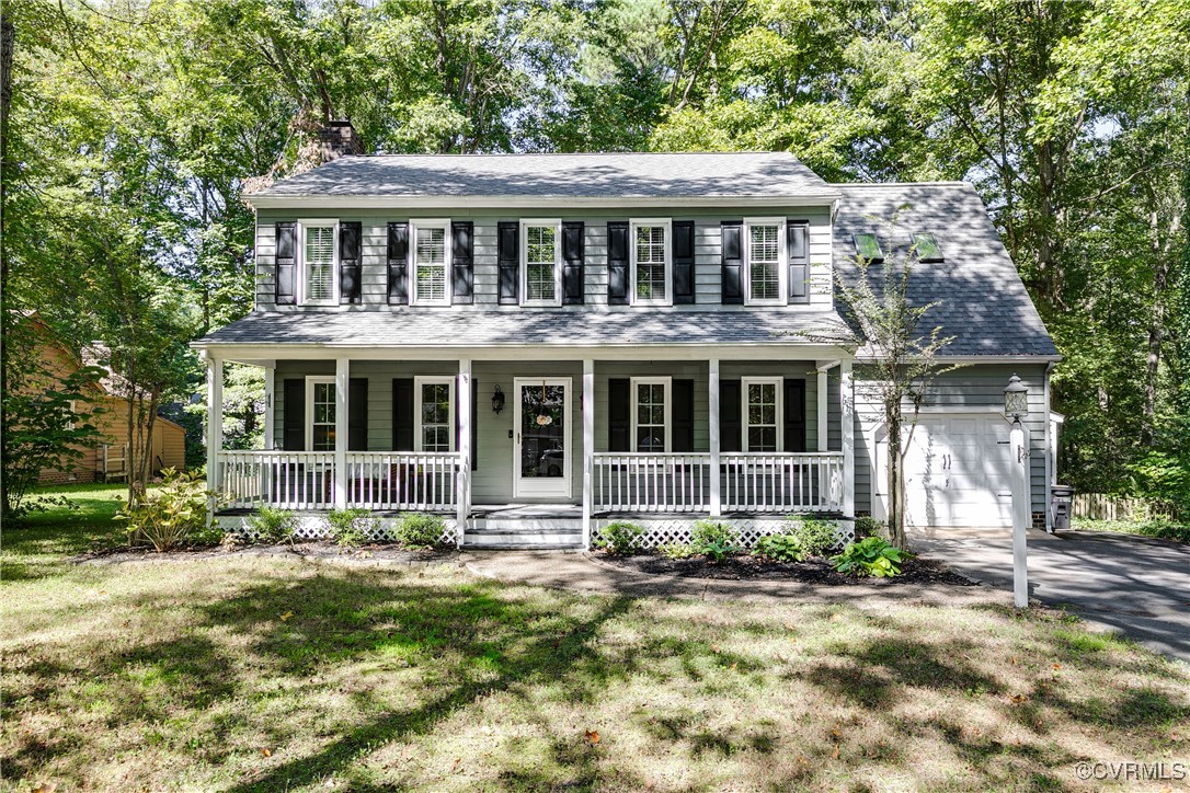 13906 Barnes Spring Road Midlothian, VA 23112 - Photo 2 of 45 a front view of a house with a yard