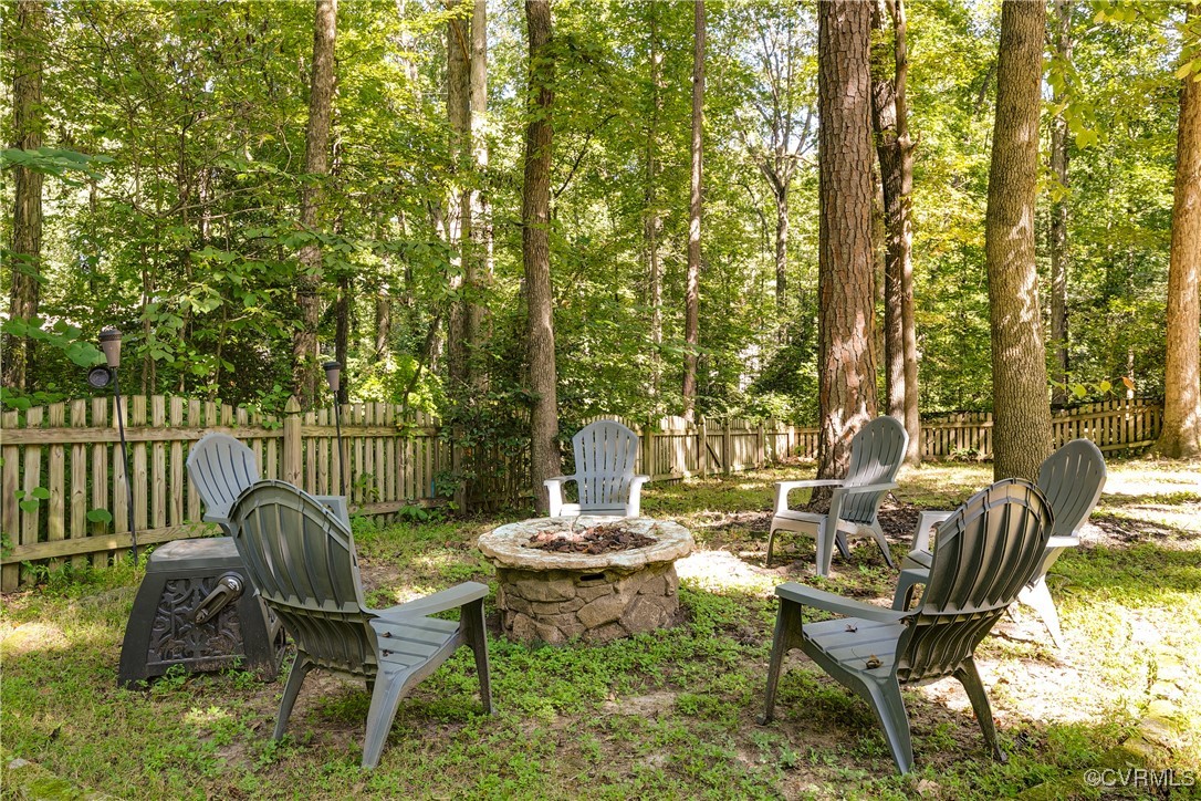 13906 Barnes Spring Road Midlothian, VA 23112 - Photo 44 of 45 a view of a chairs and table in the patio