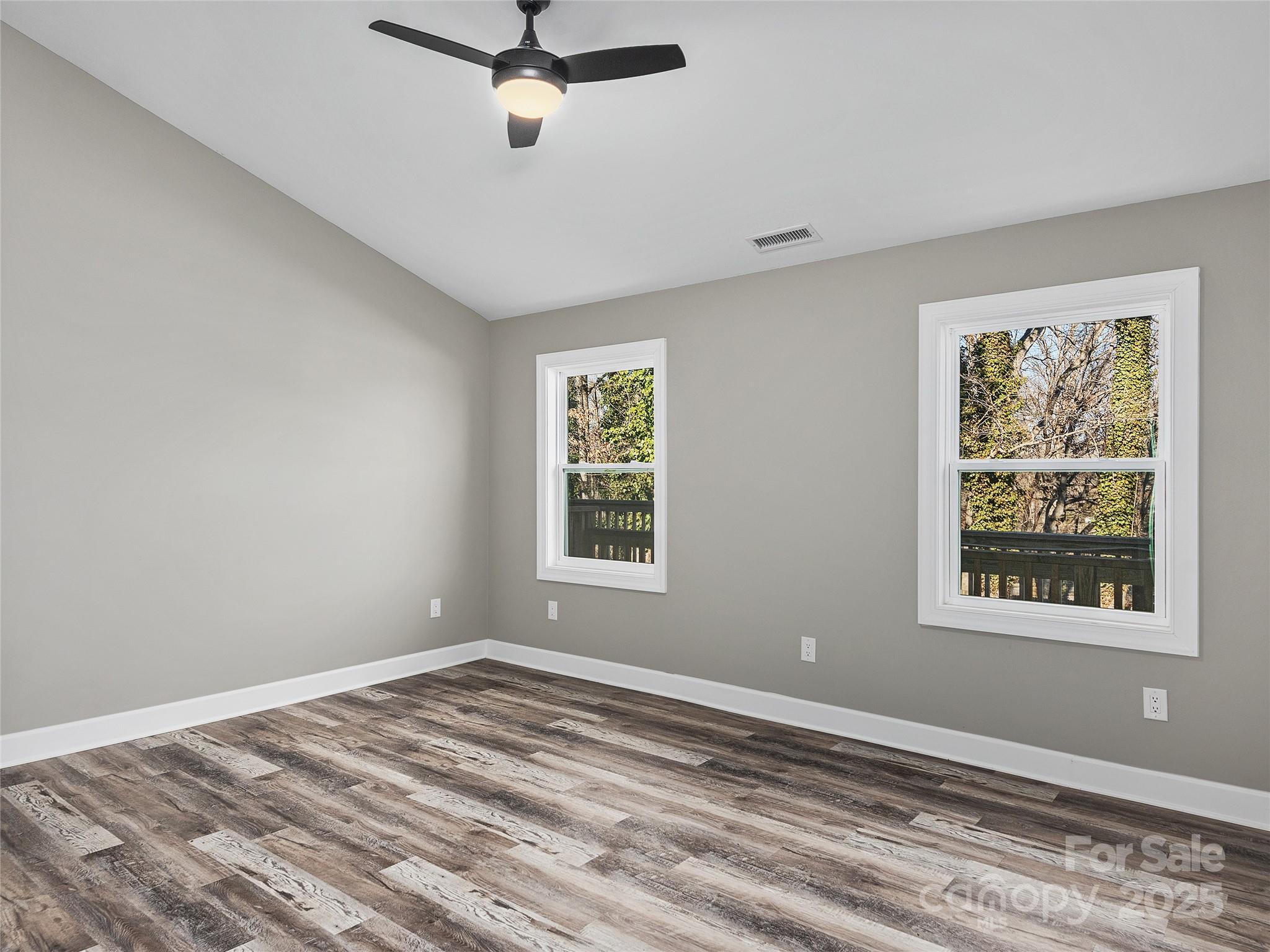 611 Peniel Road Columbus, NC 28722 - Photo 15 of 28 a view of a room with window and ceiling fan