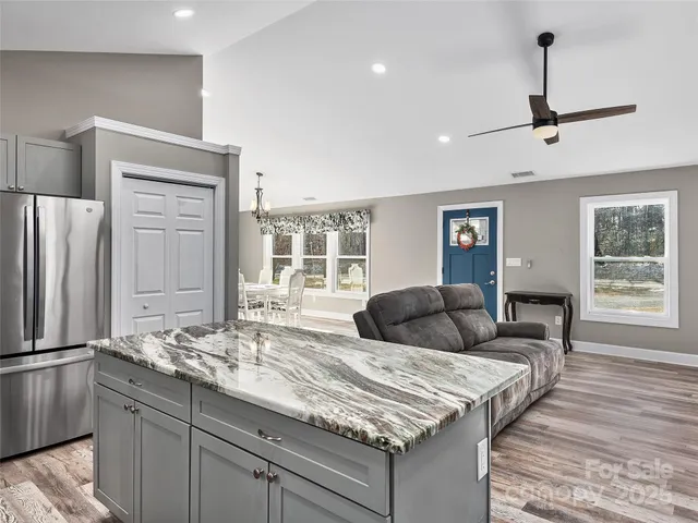 a living room with furniture and a table
