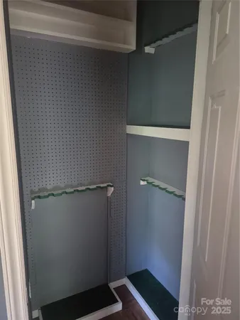 a bathroom with a tub sink and toilet