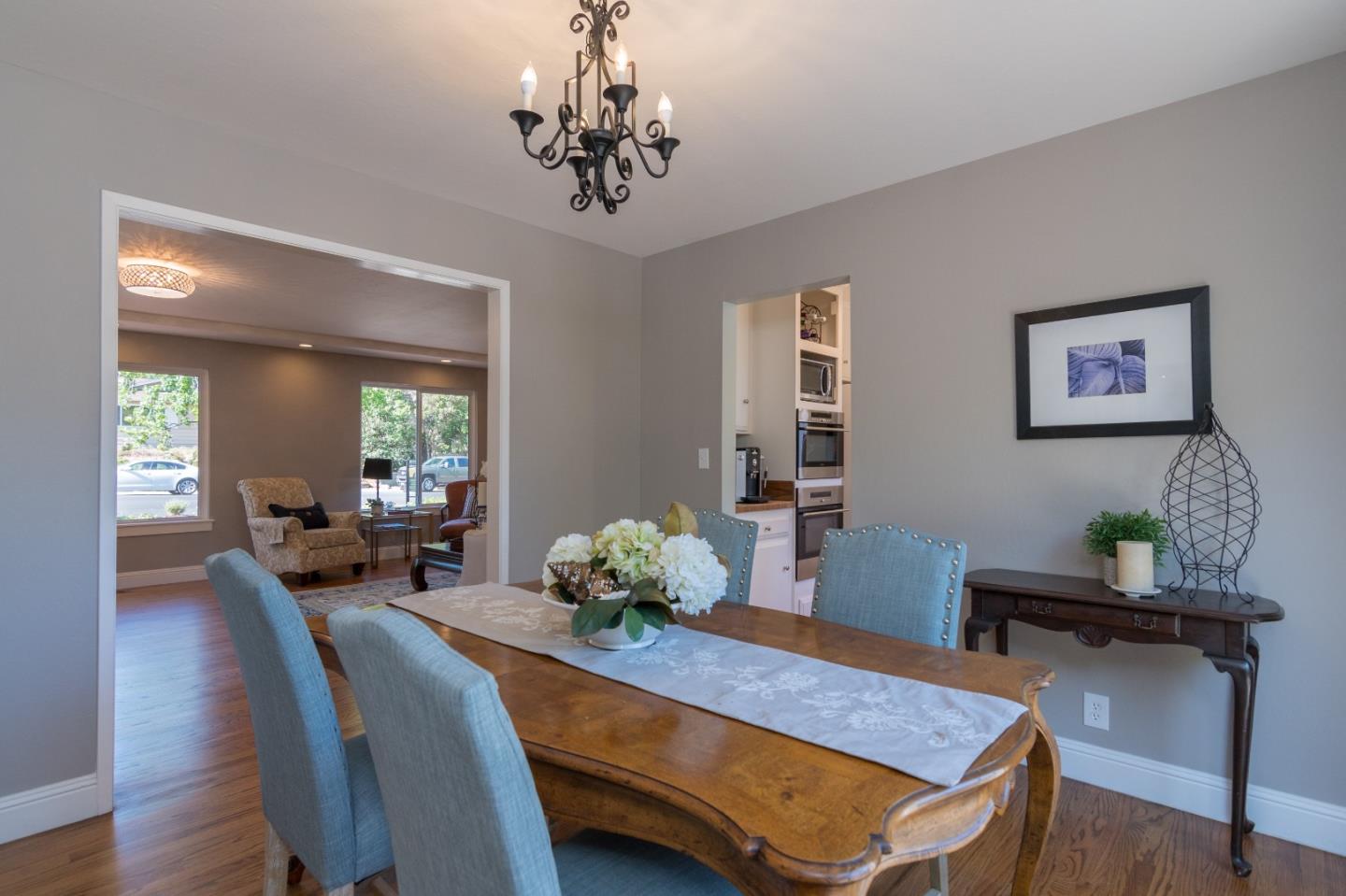 115 Belcrest Drive Los Gatos, CA 95032 - Photo 11 of 30 a living room with furniture and a chandelier