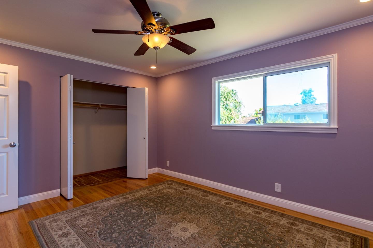 115 Belcrest Drive Los Gatos, CA 95032 - Photo 19 of 30 a bedroom with a bed and a window