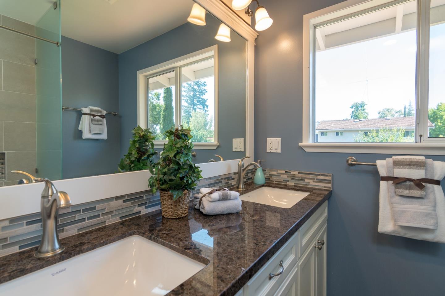 115 Belcrest Drive Los Gatos, CA 95032 - Photo 20 of 30 a kitchen with sink refrigerator and window