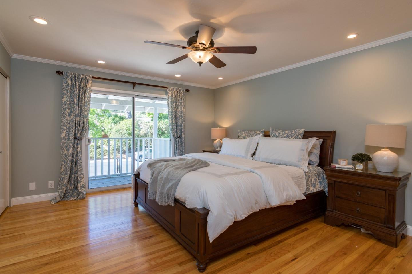 115 Belcrest Drive Los Gatos, CA 95032 - Photo 21 of 30 a bedroom with a bed and window