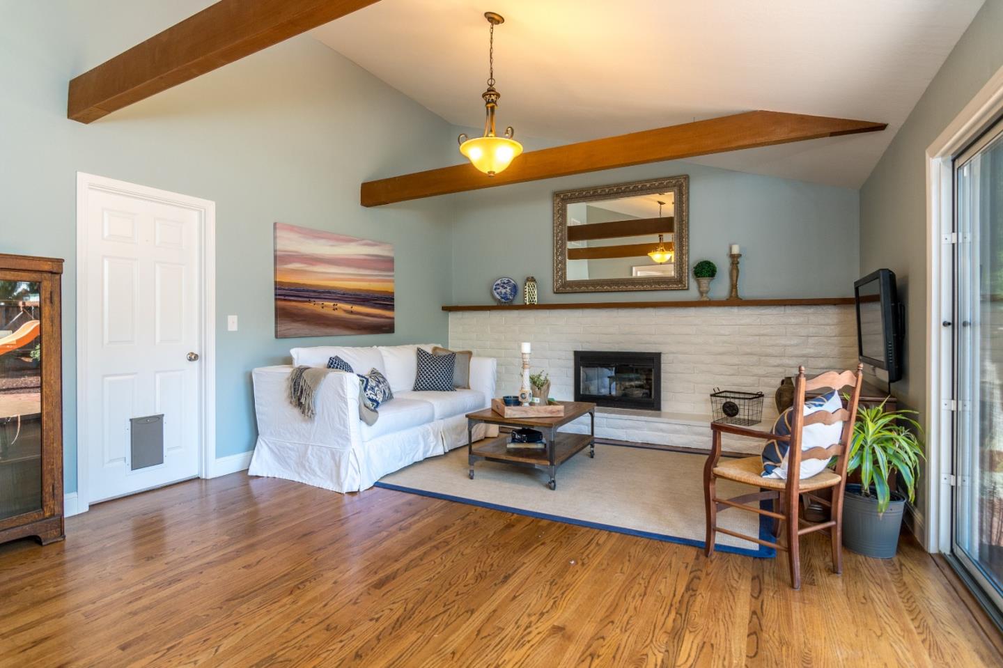 115 Belcrest Drive Los Gatos, CA 95032 - Photo 6 of 30 a living room with furniture and a fireplace