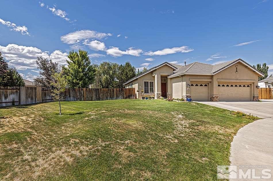 10010 Stonechase Court Reno, NV 89521 - Photo 2 of 33 a view of a house with a big yard