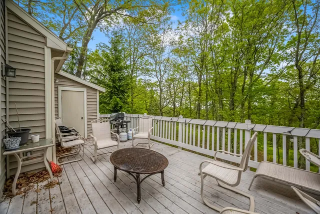 a view of a chairs and table on the wooden floor