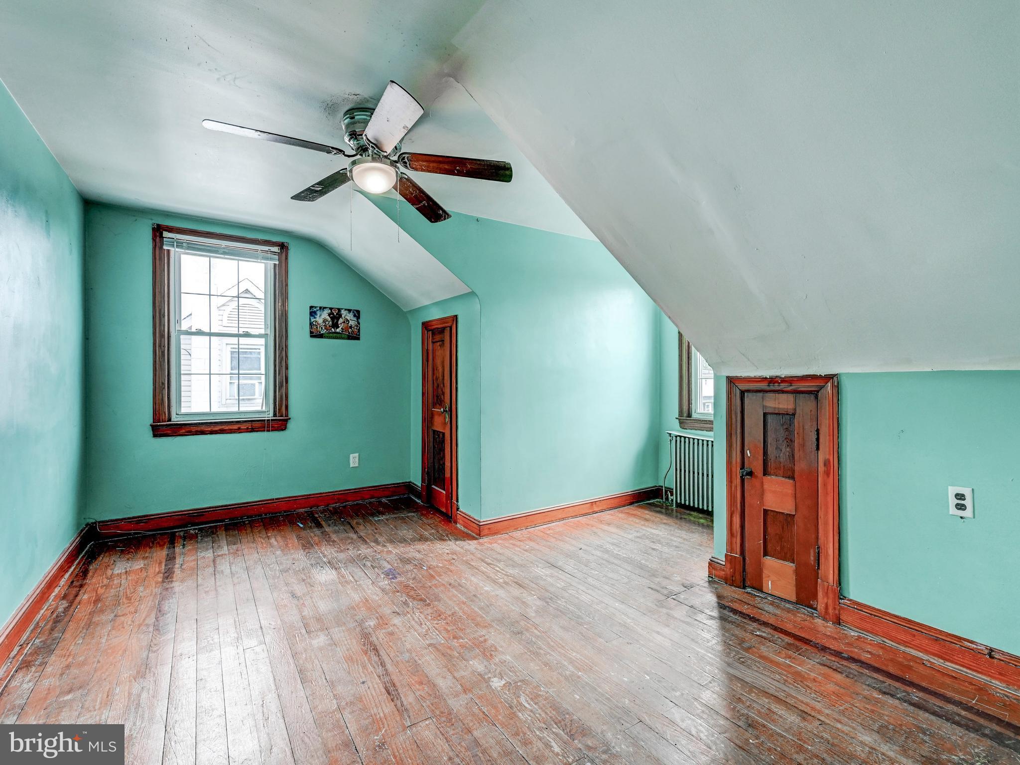 3206 Lynch Road Baltimore, MD 21219 - Photo 25 of 70 a view of empty room with window and ceiling fan
