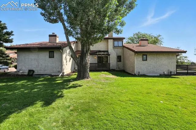 a house view with a garden space