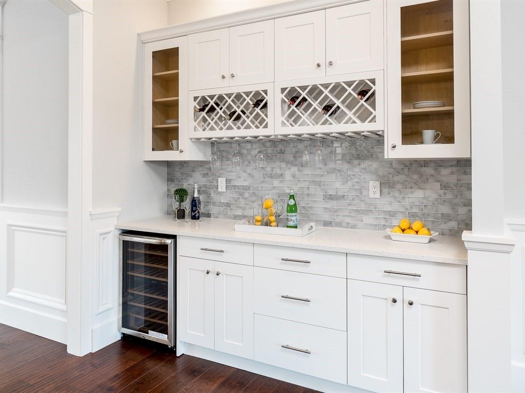 221 Cherry Lane Campbell, CA 95008 - Photo 12 of 23 a kitchen with stainless steel appliances white cabinets and a wooden floor