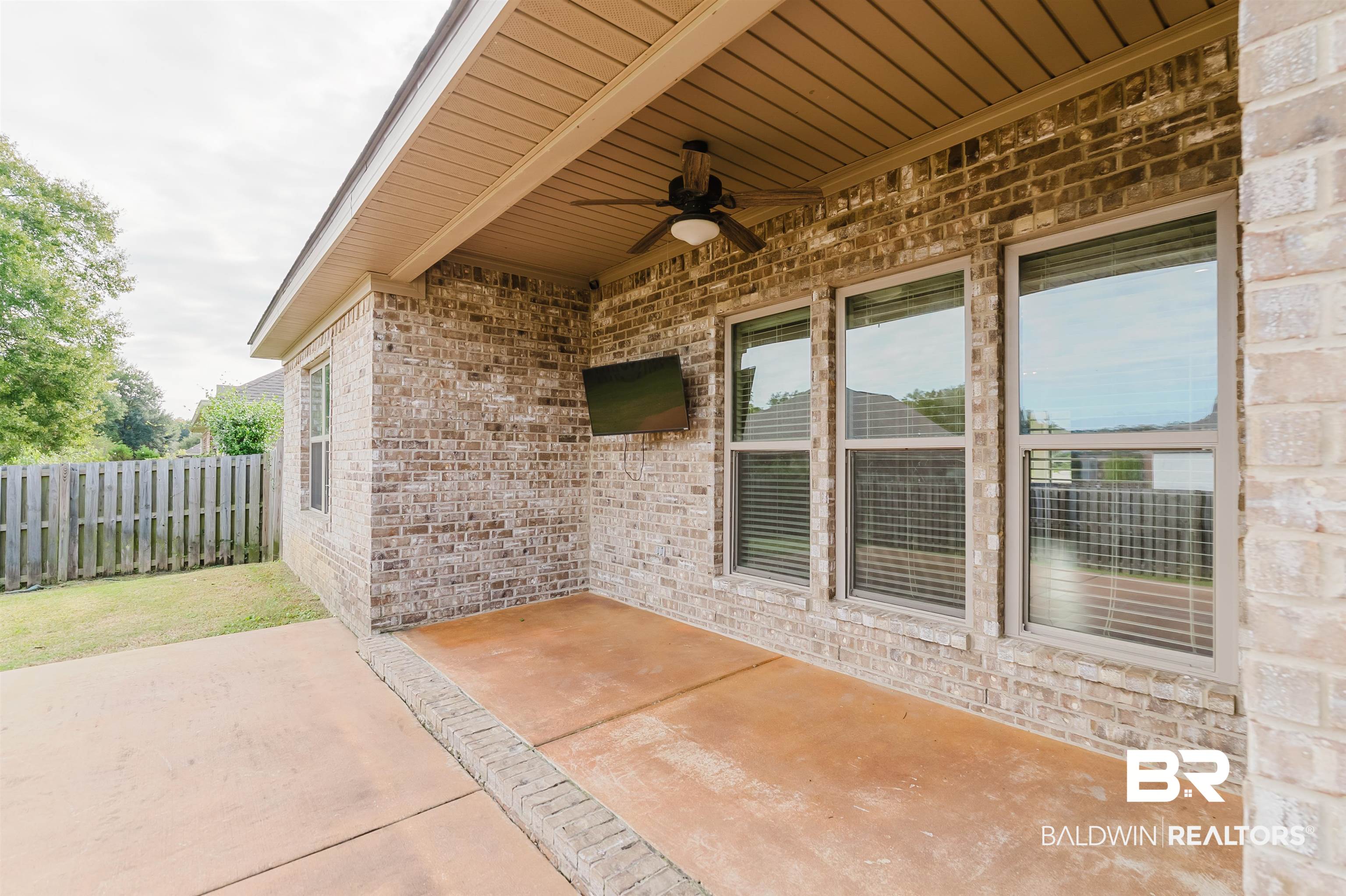 237 Hawthorne Circle Fairhope, AL 36532 - Photo 13 of 14 View of patio featuring ceiling fan