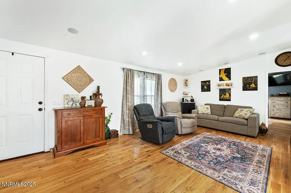 a bedroom with a bed and a white cabinets